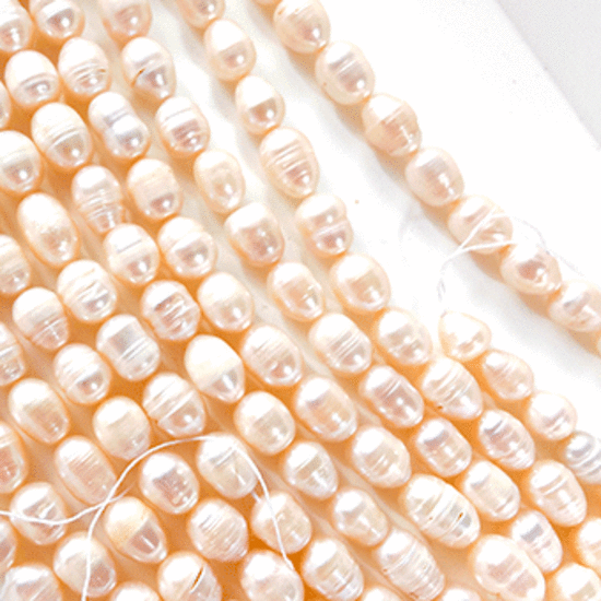 38cm Freshwater Pearl Strand: Creamy White , approx 10mm x 8mm