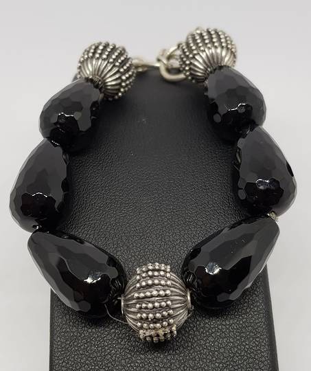 Facet cut black onyx beads and silver bracelet