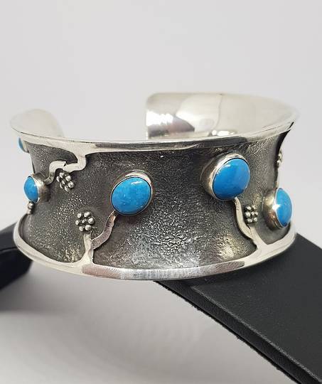 Sterling silver cuff bangle with turquoise gemstones