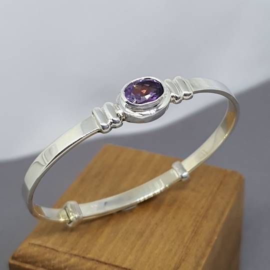 Adjustable silver baby bangle with synthetic amethyst
