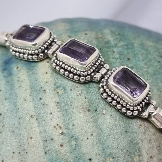 Sterling silver bracelet with purple gemstones