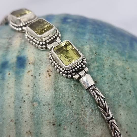 Sterling silver bracelet with green gemstones