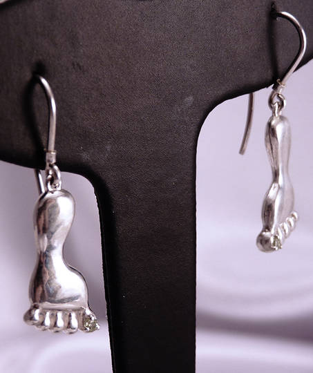 Unusual sterling silver earrings - a foot with a cubic zirconia.
