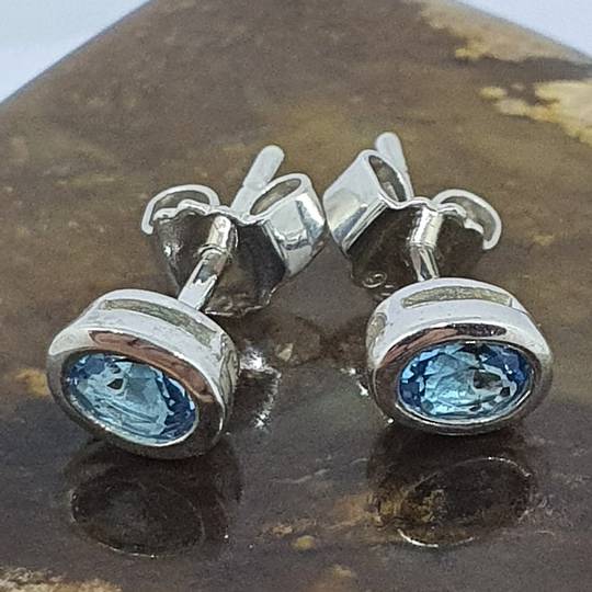 Sterling silver blue topaz stud earrings