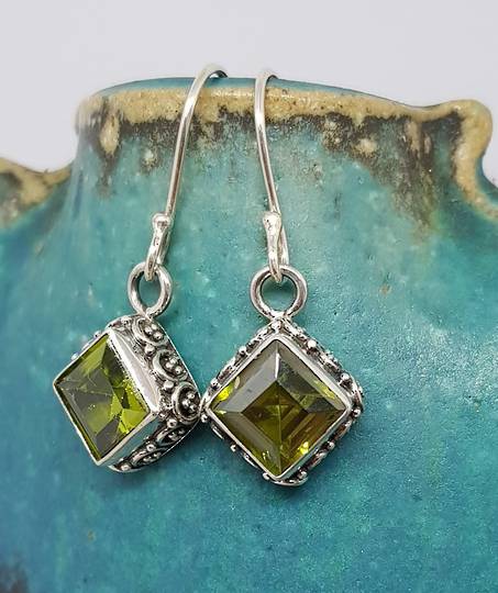 Silver peridot earrings with filigree detail
