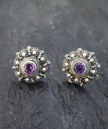 Filigree stud earrings with deep purple gemstone
