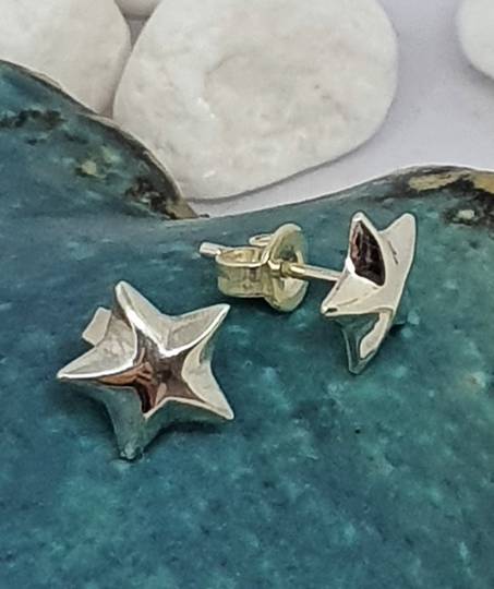 Sterling silver raised star stud earrings
