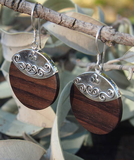 Polished wooden earrings with silver hook