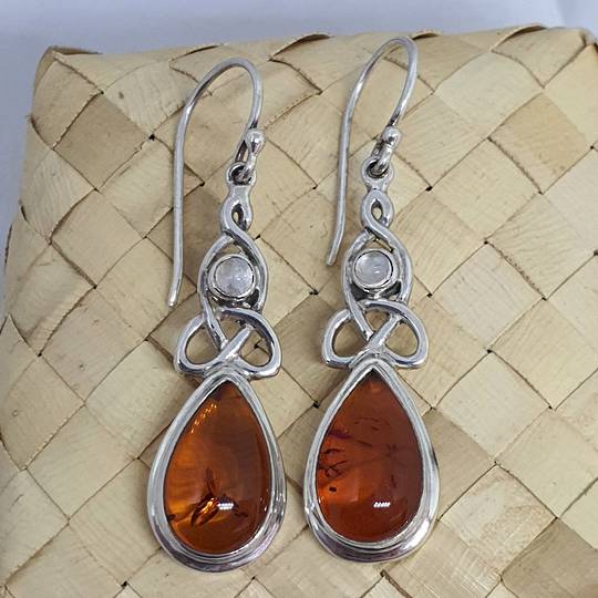 Silver amber earrings with infinity knot and moonstone