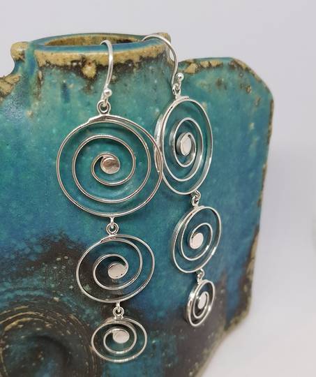 Cascading spirals of sterling silver