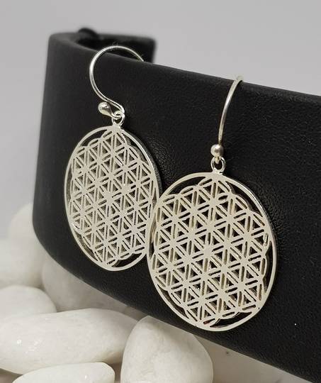 Silver earrings with triangle infinity pattern
