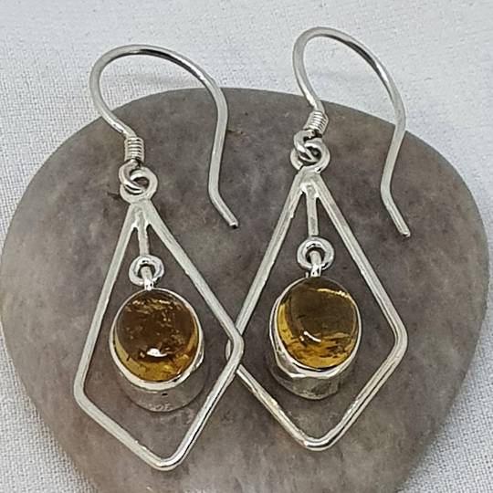 Silver hook earrings with oval citrine gemstone
