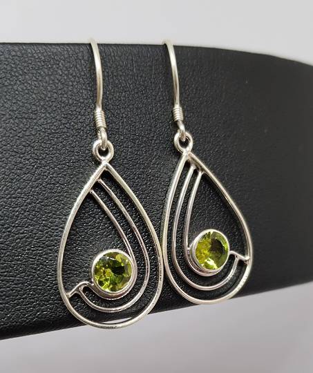 Silver peridot earrings, open teardrop shape