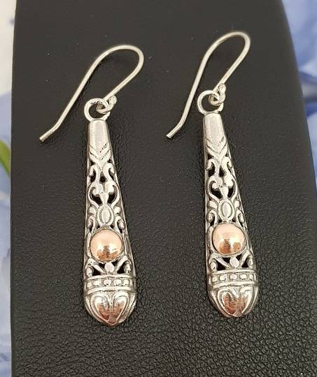 Silver filigree earrings with gold detail