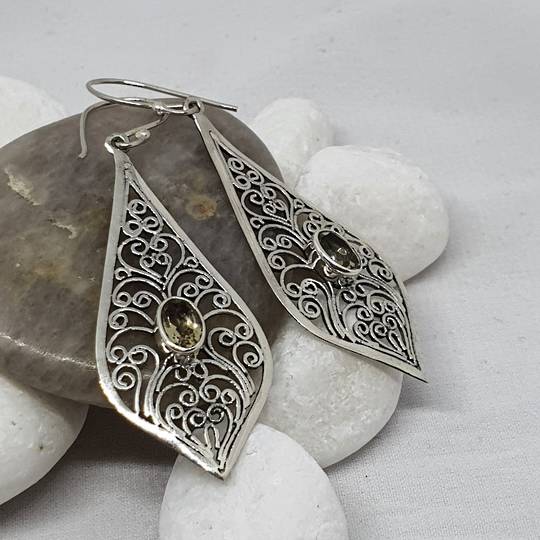 Silver filigree earrings with golden gemstone