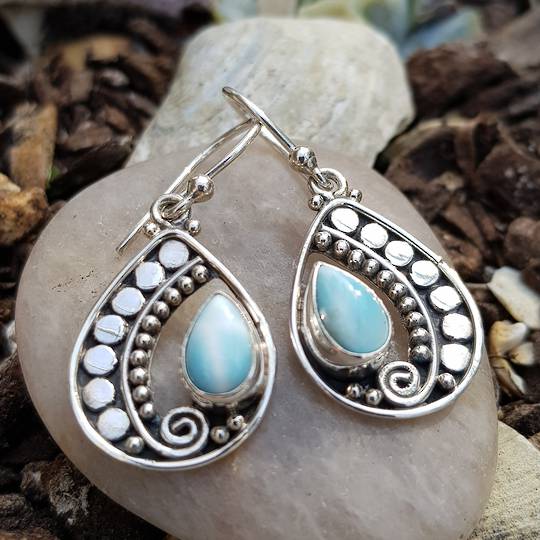 Stunning open silver teardrop earring with larimar gemstone