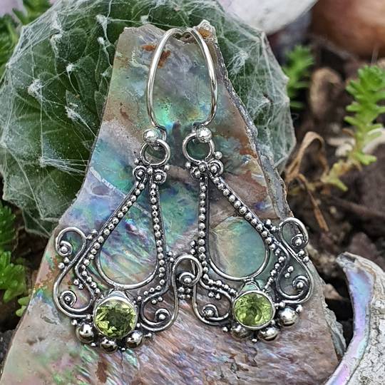 Silver filigree hook earrings with green peridot