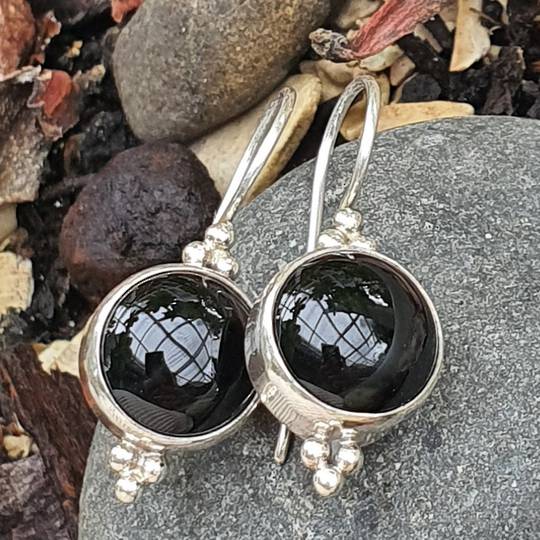 Round sterling silver onyx hook earrings