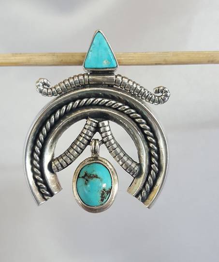 Unusual medallion turquoise silver pendant