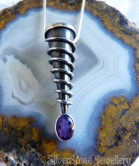 Unique, designer pendant, spiraled silver with amethyst