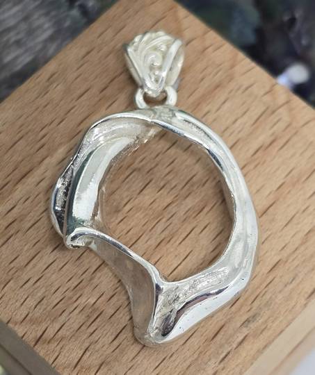 Sterling silver cast beach shell pendant