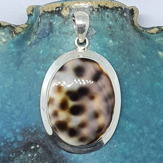 Sterling silver cowrie shell pendant