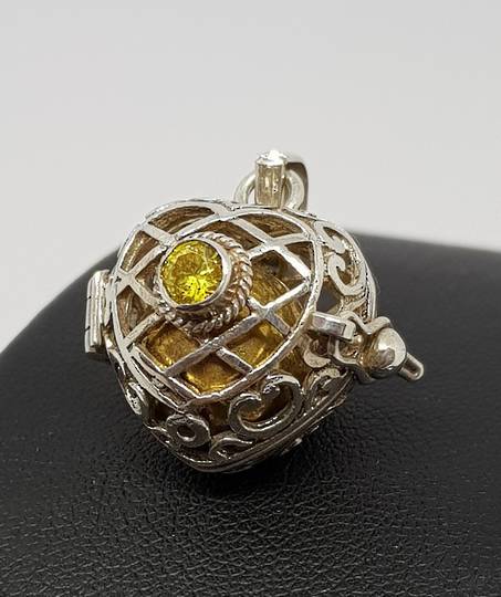 Sterling silver filigree meditation ball pendant