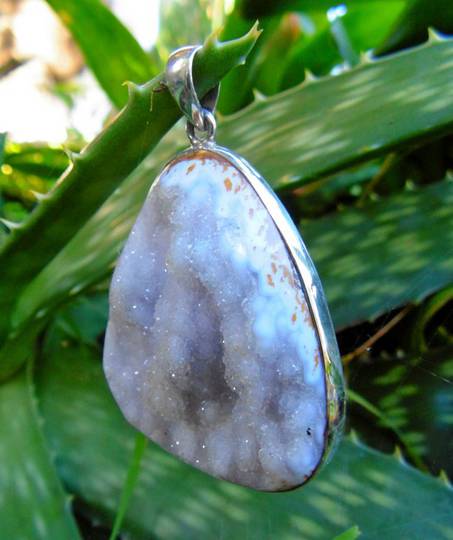 Large crystal pendant set in sterling silver