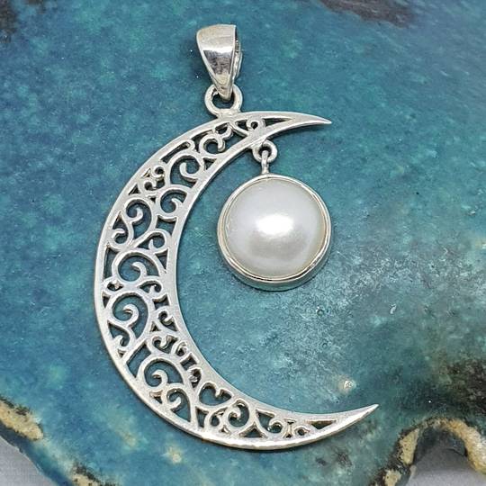 Silver crescent moon pendant with pearl