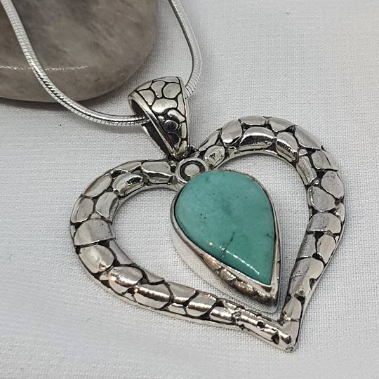 Styerling silver heart pendant with turquopise gemstone