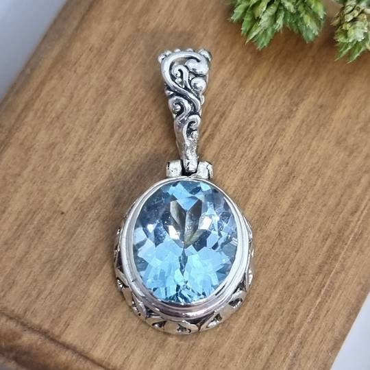 Sterling silver oval blue topaz pendant