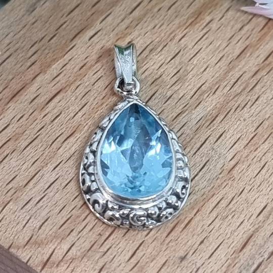 Sterling silver teardrop blue topaz pendant