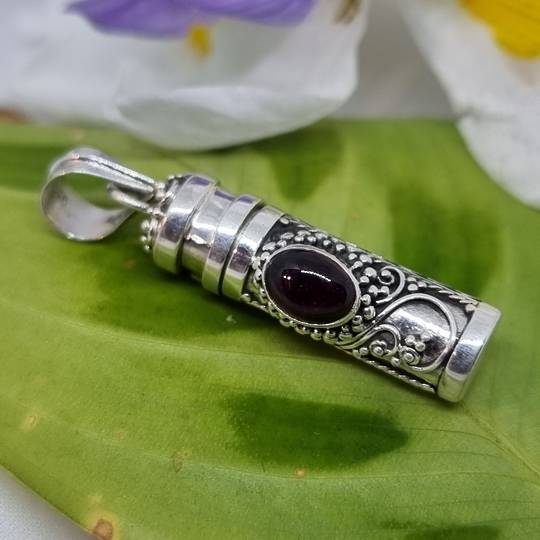 Silver filigree silver prayer box pendant with garnet