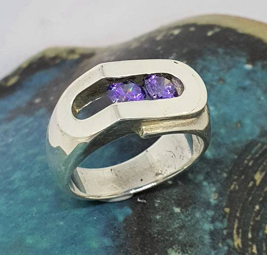 Chunky sterling silver ring with sparkling purple gemstones