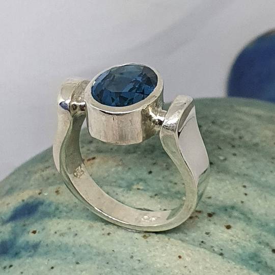 Sterling silver ring with deep blue stone