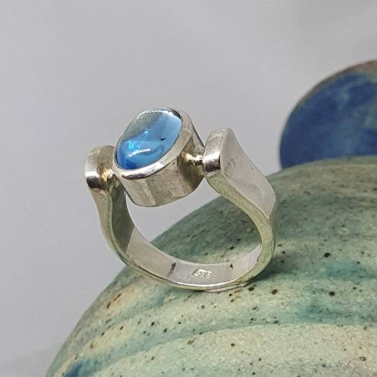 Sterling silver ring with blue gemstone