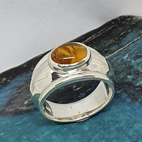 Sterling silver, wide band amber ring