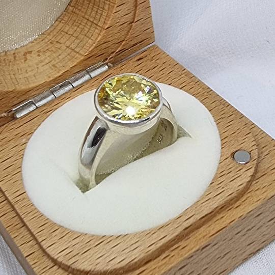 Silver synthetic topaz ring