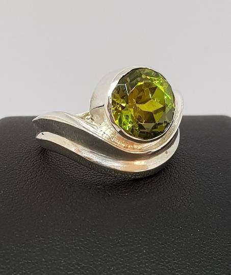 Round synthetic peridot, sterling silver ring