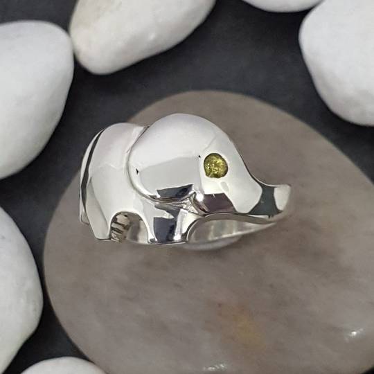 Sterling silver elephant ring with green sapphire
