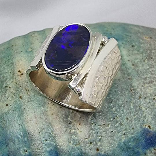 Wide hammered silver ring with Australian opal