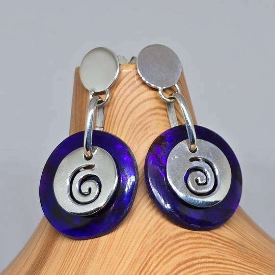 Purple paua shell earrings with koru detail