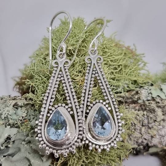 Sterling silver long blue topaz earrings