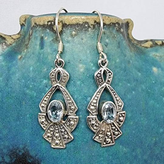 Sterling silver hooked blue topaz earrings