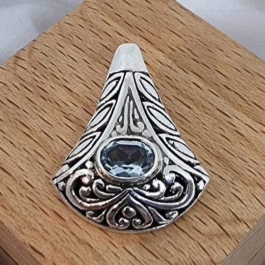 Sterling silver blue topaz pendant