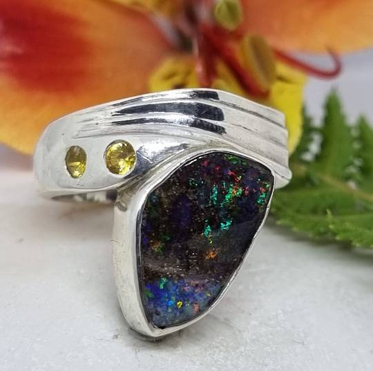 Boulder opal and natural yellow sapphire silver ring