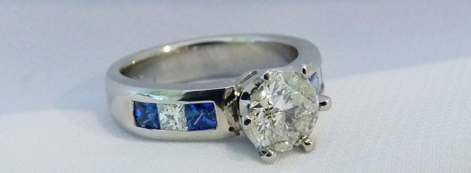 handmade sapphire and diamond platinum engagement ring SilverStone jewellery
