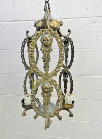 Antique Cast Brass hanging light,  Angel or Cherub Motif